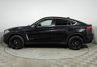 Подержанный автомобиль BMW X6 2015 года (8 фото)