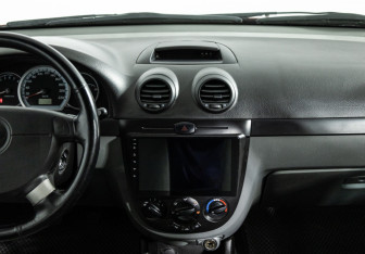 Подержанный автомобиль Chevrolet Lacetti Wagon 2008 года (14 фото)