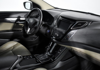 Подержанный автомобиль Hyundai i40 Sedan 2015 года (14 фото)