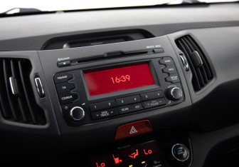 Подержанный автомобиль Kia Sportage 2011 года (18 фото)