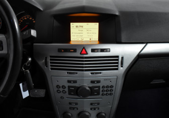 Подержанный автомобиль Opel Astra Hatchback 2010 года (16 фото)