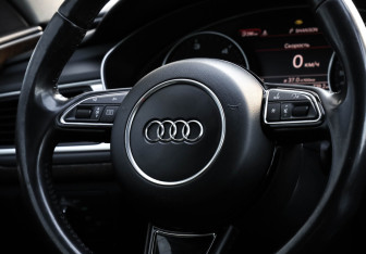 Подержанный автомобиль Audi A7 2012 года (15 фото)