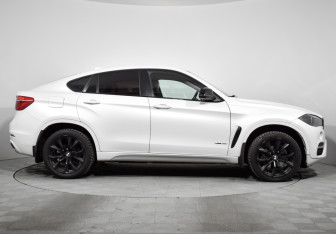 Подержанный автомобиль BMW X6 2016 года (4 фото)