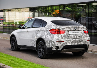Подержанный автомобиль BMW X6 2013 года (8 фото)