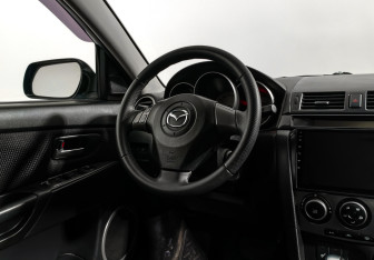 Подержанный автомобиль Mazda 3 Sedan 2007 года (15 фото)