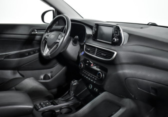 Подержанный автомобиль Hyundai Tucson 2018 года (13 фото)
