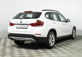 Подержанный автомобиль BMW X1 2014 года (5 фото)