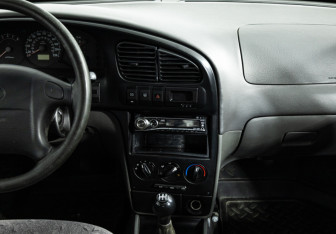 Подержанный автомобиль Kia Spectra Sedan 2007 года (14 фото)