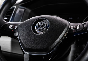 Подержанный автомобиль Volkswagen Multivan 2015 года (14 фото)