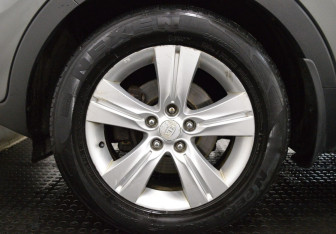 Подержанный автомобиль Kia Sportage 2012 года (9 фото)