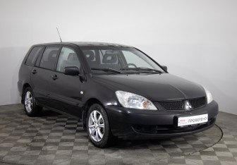 Подержанный автомобиль Mitsubishi Lancer Wagon 2005 года (3 фото)