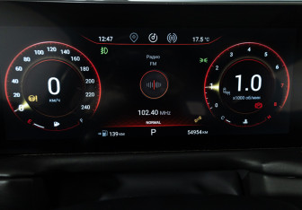 Подержанный автомобиль Exeed TXL 2023 года (12 фото)