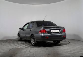 Подержанный автомобиль Mitsubishi Lancer Sedan 2006 года (7 фото)