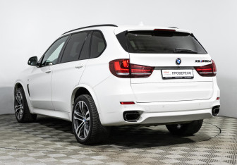Подержанный автомобиль BMW X5 2014 года (7 фото)
