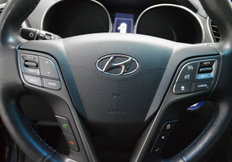 Подержанный автомобиль Hyundai Santa Fe 2016 года (17 фото)