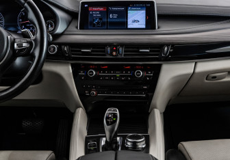 Подержанный автомобиль BMW X6 2018 года (14 фото)