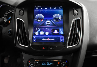 Подержанный автомобиль Ford Focus Hatchback 2014 года (19 фото)