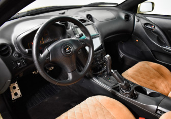 Подержанный автомобиль Toyota Celica Liftback 2002 года (9 фото)