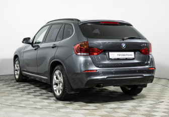 Подержанный автомобиль BMW X1 2014 года (7 фото)
