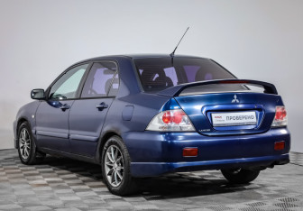 Подержанный автомобиль Mitsubishi Lancer Sedan 2006 года (7 фото)