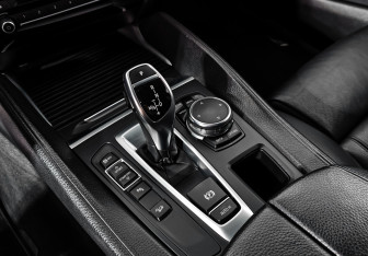 Подержанный автомобиль BMW X6 2015 года (17 фото)