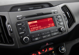 Подержанный автомобиль Kia Sportage 2013 года (18 фото)