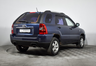Подержанный автомобиль Kia Sportage 2009 года (5 фото)