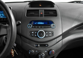 Подержанный автомобиль Chevrolet Spark 2012 года (15 фото)