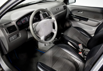 Подержанный автомобиль Kia Rio Wagon 2005 года (10 фото)