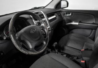 Подержанный автомобиль Kia Sportage 2009 года (9 фото)