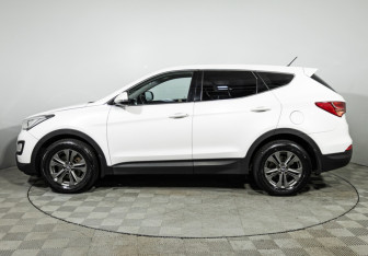 Подержанный автомобиль Hyundai Santa Fe 2015 года (8 фото)