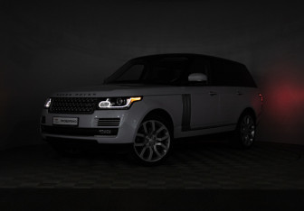 Подержанный автомобиль Land Rover Range Rover 2015 года (32 фото)