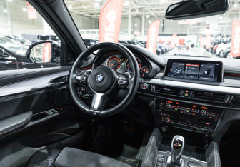 Подержанный автомобиль BMW X6 2016 года (21 фото)
