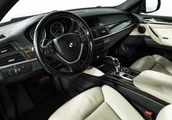 Подержанный автомобиль BMW X6 2013 года (11 фото)