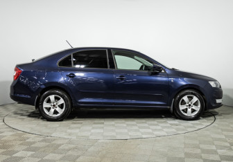 Подержанный автомобиль Skoda Rapid Liftback 2015 года (4 фото)