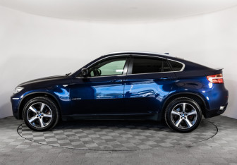 Подержанный автомобиль BMW X6 2013 года (10 фото)