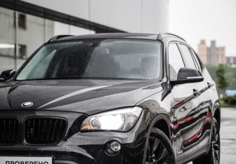 Подержанный автомобиль BMW X1 2013 года (2 фото)