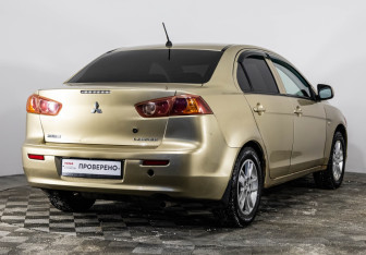 Подержанный автомобиль Mitsubishi Lancer Sedan 2008 года (5 фото)