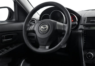 Подержанный автомобиль Mazda 3 Sedan 2007 года (14 фото)