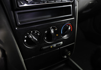 Подержанный автомобиль Kia Spectra Sedan 2009 года (13 фото)