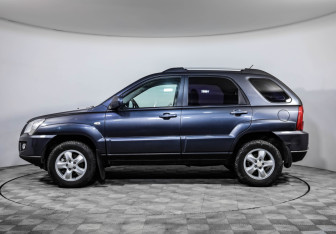Подержанный автомобиль Kia Sportage 2010 года (8 фото)