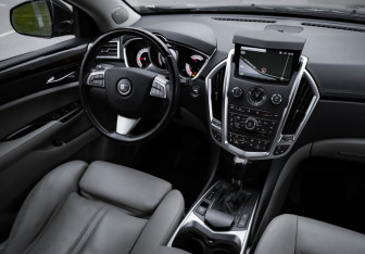 Подержанный автомобиль Cadillac SRX 2012 года (11 фото)
