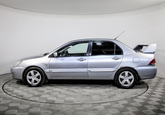Подержанный автомобиль Mitsubishi Lancer Sedan 2006 года (8 фото)