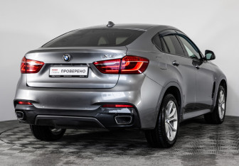 Подержанный автомобиль BMW X6 2018 года (6 фото)