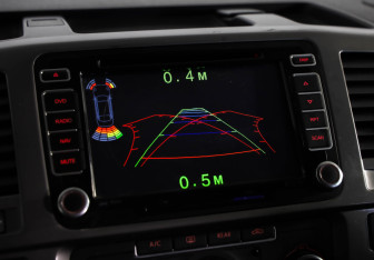 Подержанный автомобиль Volkswagen Caravelle 2013 года (14 фото)