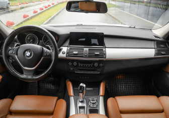 Подержанный автомобиль BMW X6 2013 года (11 фото)