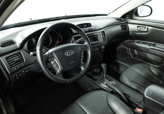 Подержанный автомобиль Kia Magentis 2010 года (11 фото)