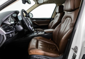 Подержанный автомобиль BMW X5 2015 года (24 фото)