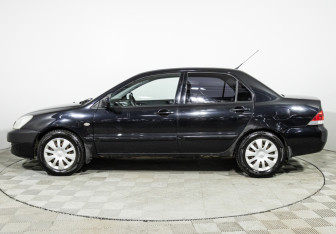 Подержанный автомобиль Mitsubishi Lancer Sedan 2009 года (8 фото)