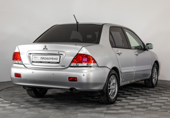Подержанный автомобиль Mitsubishi Lancer Sedan 2006 года (5 фото)